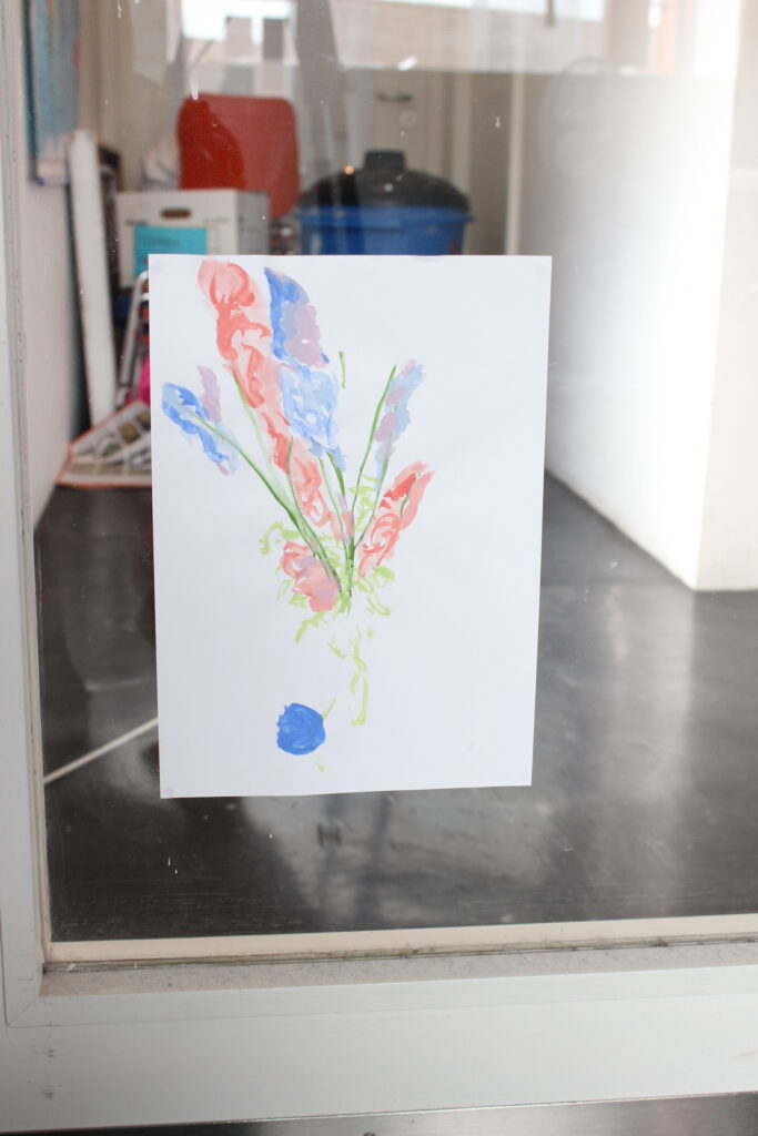 a4 watercolour painting of flowers on a glass door